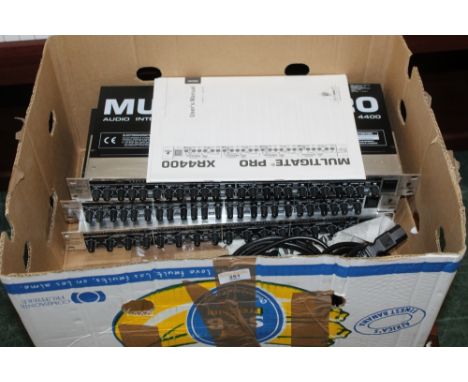 A Behringer multi gate pro MDX4400 quad dynamics processor and two ditto quad expander/gate units, with power supplies and us
