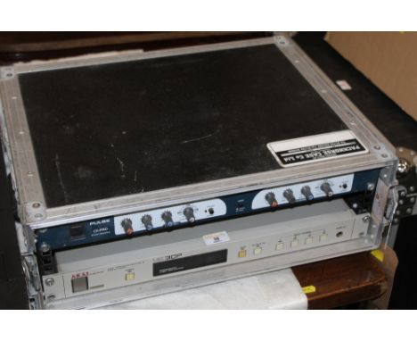 A Pulse CX-Pro two channel stereo crossover and a Akai Professional ME30P programmable Patch Bay, contained in Packhorse rack