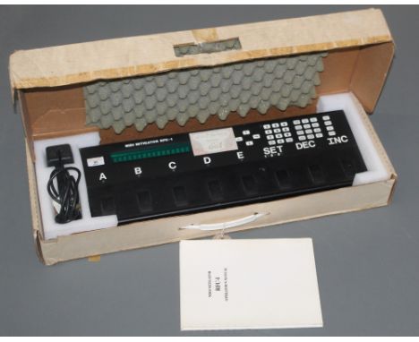 A 1980's Lake Butler Sound Company Inc, midi mitigator RFC-1, boxed with power supply and manual