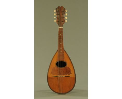 An early 20th century Stridente 8 string Neapolitan mandolin, 59 cm long, together with De Pietro (Mario), The First Step - H