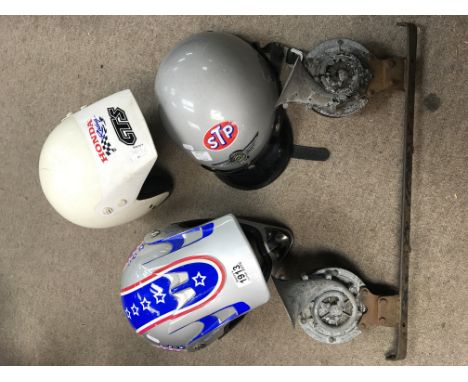 Three interesting motorbike crash helmets and pair of vintage car horns