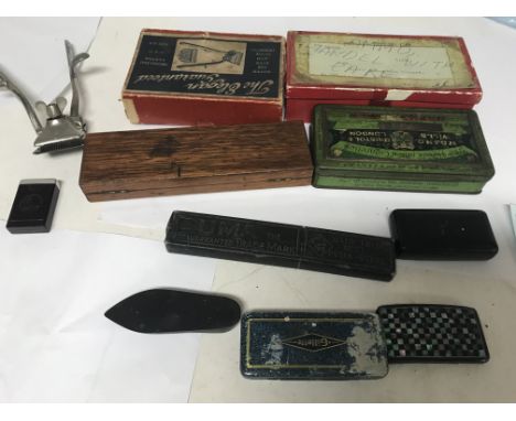 A collection of oddments snuff box razors tin boxes dominos set