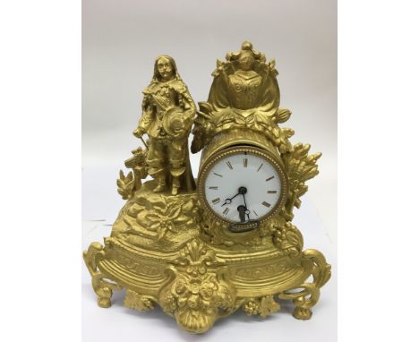 A French ,ormolu style figural clock  with painted dial.Approx 32cm high