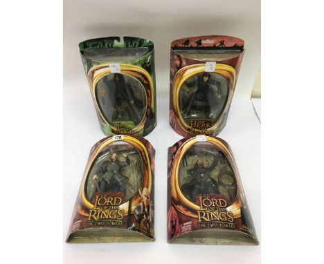 Four boxed Lord of the Rings figures