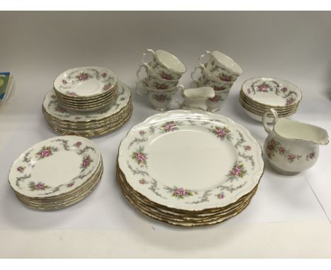 A Royal Albert tea set and dinner service with a fruit bowl and jug.