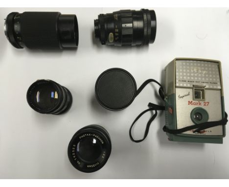 A group of lenses including Vivitar, Kogaku, Photax and others. Kodak starmite camera