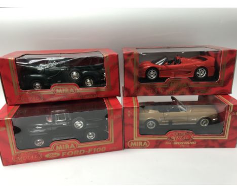 A collection of boxed 1:18 scale diecast vehicles including, Mira golden line, Ferrari F50, Chevrolet pick up, Ford F100 and 