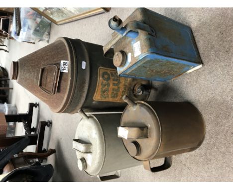 Four vintage paraffin cans including a five gallon Esso blue with tap