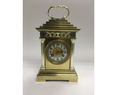A brass cased 8 day French mantle clock, approx 21.5cm.