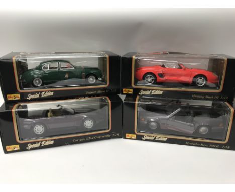 A collection of boxed 1:18 scale diecast vehicles including, Maisto special editions, Jaguar MK ll, Mustang Mach lll, Mercede