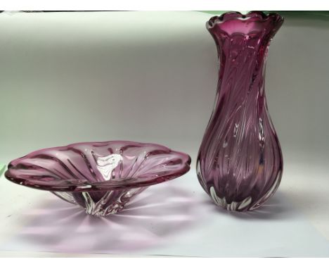 A light cranberry fruit bowl and a matching vase