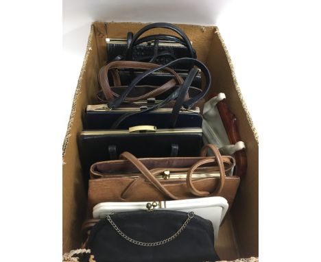 A collection of vintage frame handbags
