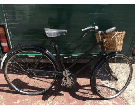 A vintage lady's Rayleigh bike having small frame, rod brakes, Wright's saddle and basket, a/f