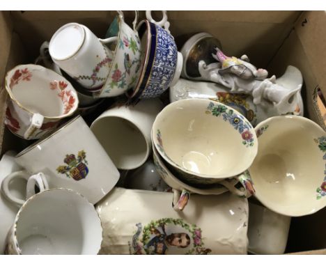 A box containing a quantity of decorative cups and saucers vintage commemorative ware etc.