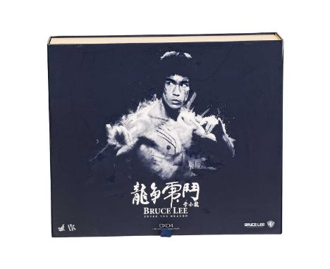 A Bruce Lee Hot Toys Enter The Dragon 1:6 scale figure, DX04, some scuffs to box.