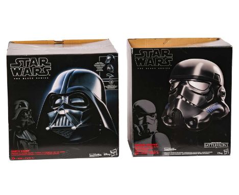 A Hasbro Star Wars Black Series Darth Vader Premium Electronic Helmet, in original box and apparently unused, together with a