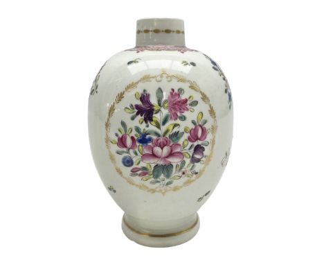 Mid 18th century Worcester tea caddy or teapoy, of oviform, painted in polychrome enamels with a reserve of flowers within a 