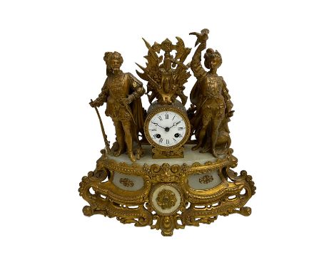 Late 19th century alabaster and gilt spelter mantle clock c1880, on a rococo base with alabaster panels and two flamboyant fi