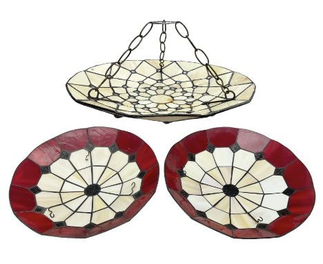 Three Tiffany style leaded ceiling light shades, comprising pair with cream and red panels and further mosaic style cream exa