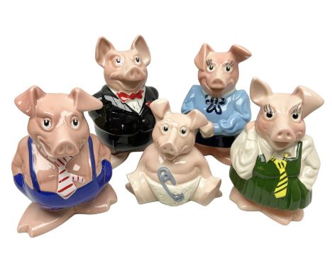 Set of five Wade NatWest money boxes, comprising father, mother, boy, girl and baby, four with original boxes