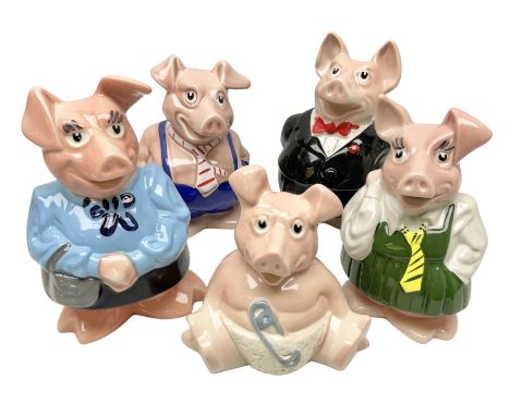 Set of five Wade NatWest money boxes, comprising father, mother, boy, girl and baby, four with original boxes