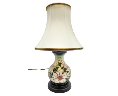 Moorcroft table lamp of baluster form, decorated in the Hibiscus Moon pattern, with Moorcroft cream fabric shade with yellow,