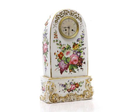 A French porcelain cased mantel clock, c.1840, decorated with floral spray to a gilt border and scroll base to the plinth27cm