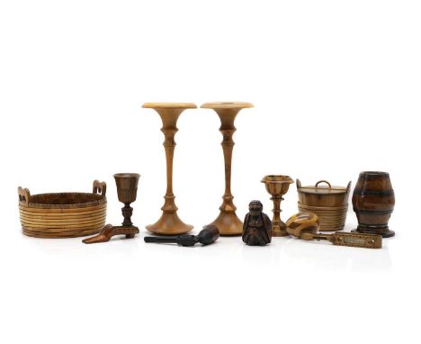 A collection of treen,  19th century and later, comprising a miniature basket, 8cm high, a miniature goblet, 12cm high, and a