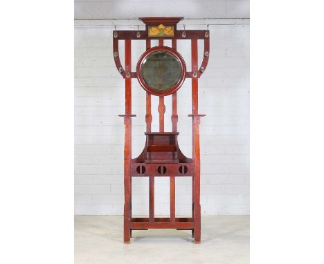 A Liberty & Co. mahogany hallstand, c.1900, the top inlaid and stained with a panel depicting two birds, over a bevelled circ