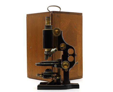 A Carl Zeiss 'Jena' monocular microscope early 20th century, no. 85229, in a fitted case,34cm high