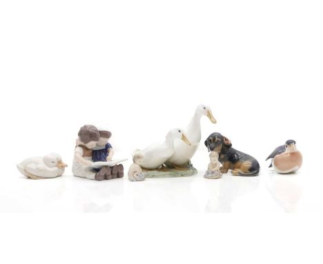 A collection of six Royal Copenhagen figures, 20th century, to include to pairs of ducks and a dachshund, a pair of young mer