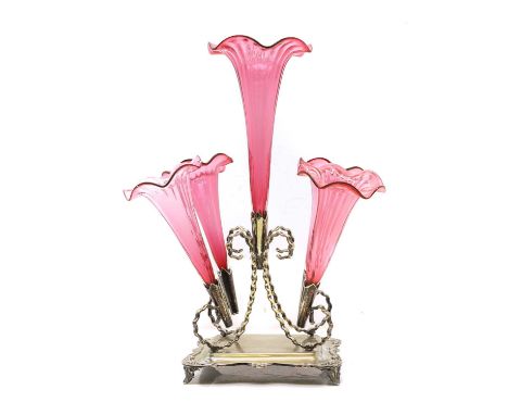 A Victorian cranberry glass and silver plated epergne, with five spill flutes, 39cm highCondition ReportTarnishing and wear. 