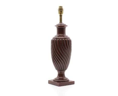 A faux rouge marble lamp  20th century, resin, of urn form,  37cm high to the fittingProvenance: The Estate of the Late Jacki