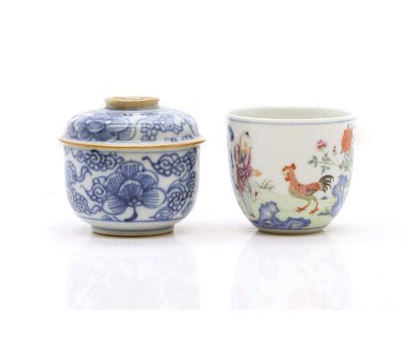 A Chinese famille rose chicken cup, 20th century, painted with a boy playing with chickens in a garden, inscribed, with a six
