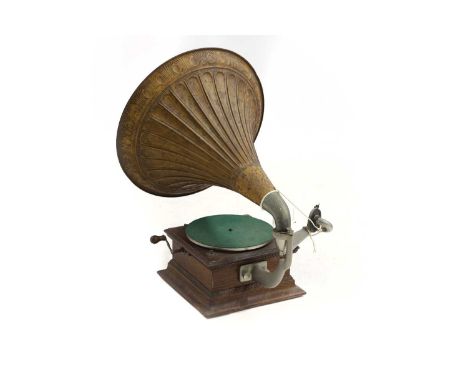 An oak cased gramophone, labelled 'The Gramophone and Typewriter Ltd', with needles, horn, 49cm diameter, 68cm highCondition 