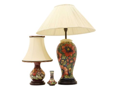A Moorcroft table lamp, of baluster form, with shade, 63cm highand another smaller table lamp, with a fabric shade, 37cm high