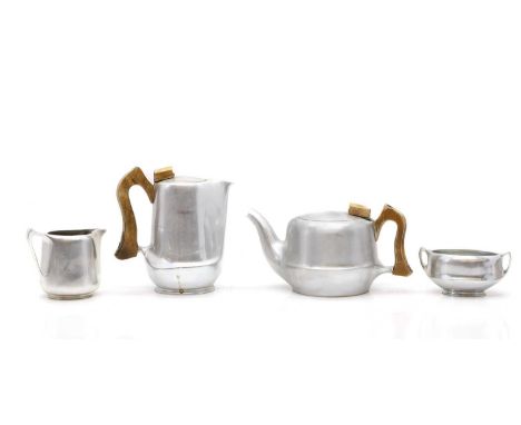 A Picquot ware metal four piece tea service  mid 20th century, comprising a hot water pot, 19cm high, teapot, 23cm wide, crea