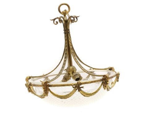 A gilt bronze and cut glass ceiling light, early 20th century, with a cut glass dished shade, the mounts with applied rams he