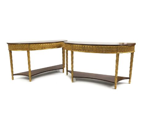 A pair of inlaid walnut and parcel gilt console tables, 20th century, the inlaid demi lune top above acanthus decorated friez