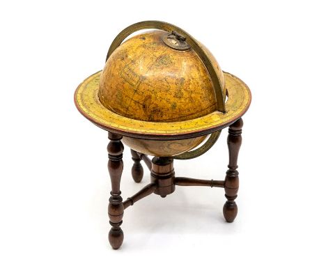 A late Victorian Newtons New and Improved Celestial globe, on turned mahogany stand, stamp to body and dated 1888 (damaged) H