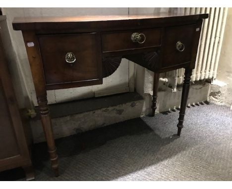 A George III mahogany bowfront sideboard of small proportions, single frieze drawers flanked by deeper drawers either side, r