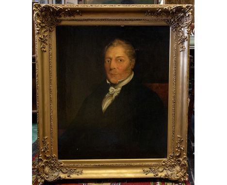 British School, circa 1830, a portrait of a gentleman, half length seated, wearing a white stock and black tunic, oil on re-l