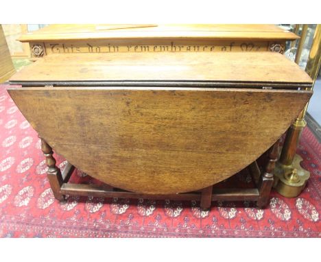 A 17th Century style joined oak gateleg table, traditionally made in the 20th Century using traditional techniques, the centr