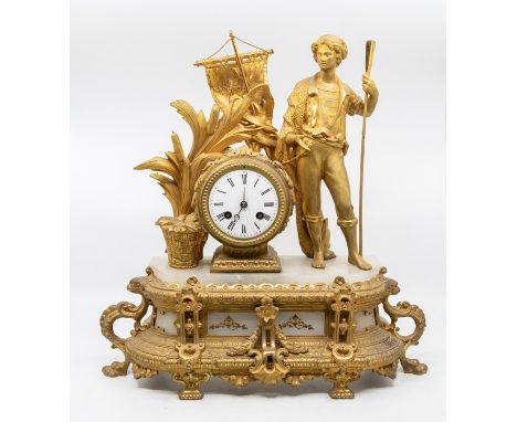 A 19th century French gilt spelter and alabaster figural mantel clock. cast with a young male, reeds and a basket of fish, fl