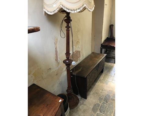 A traditional wooden floor lamp, tassel shade, fluted column with knops, acanthus carved circular base, height excluding shad