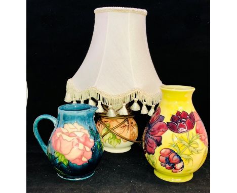 A Moorcroft 'Anemone' pattern yellow ground baluster vase. Height approx 18.5cm; 'Rose' pattern jug designed by Sally Tuffin 