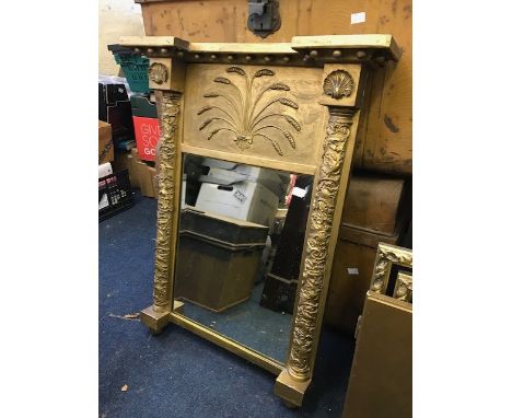 A Regency giltwood pier looking glass, circa 1825, ball cornice, wheatsheaf frieze, 81cm by 61cm, another similar and a recen