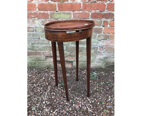 A George III oval mahogany lamp table, tray top, strung frieze, tapered block legs. width 33cmCondition: in need of attention