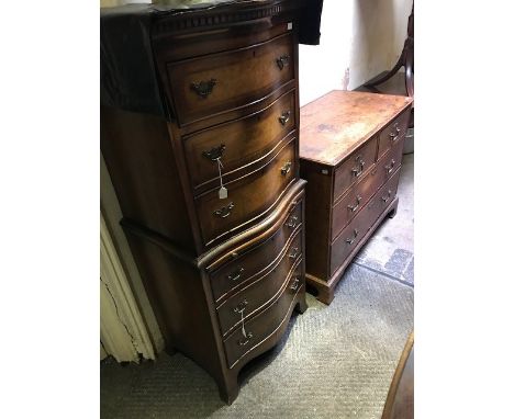 A Georgian style mahogany and walnut bowfront chest on chest, 20th Century, dentil cornice, the upper section with three draw