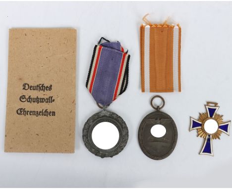 Third Reich Medals, Westwall medal with packet by Carl Poellath, Luftschutz medal in zinc, Mother cross gold grade with small